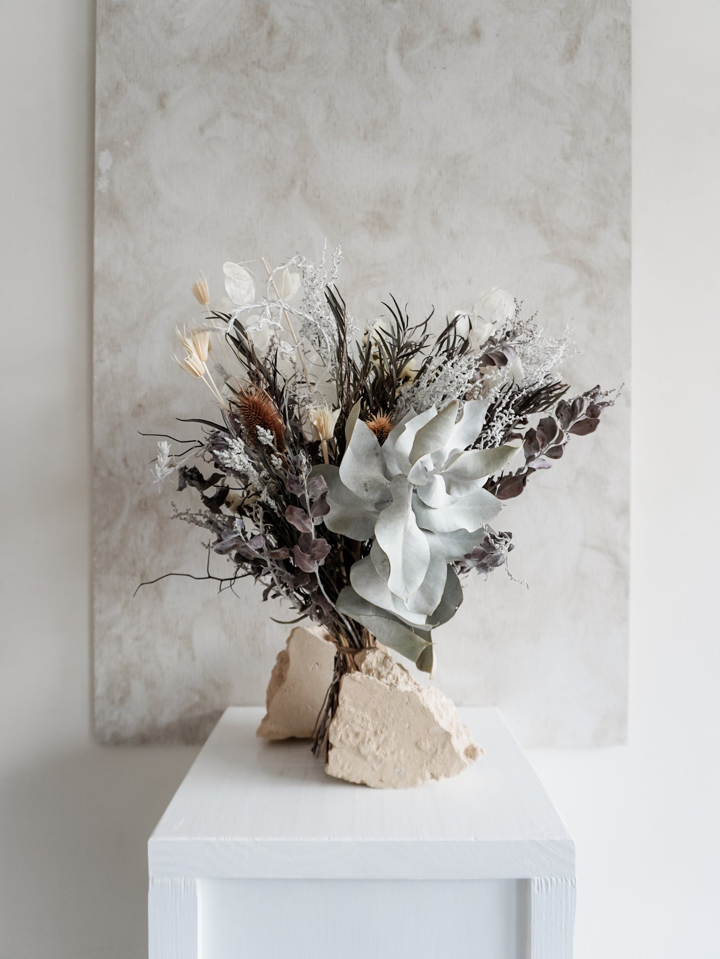 Dried flower bouquet in classic silver tones with statement foliage – Classic Size Distant View.