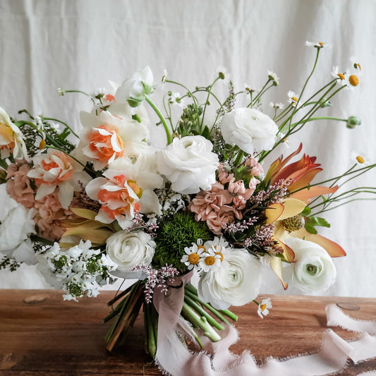 Bridal bouquet using fresh spring blooms.