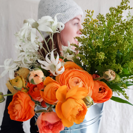 Bucket full of Spring blooms locally grown in Perth.