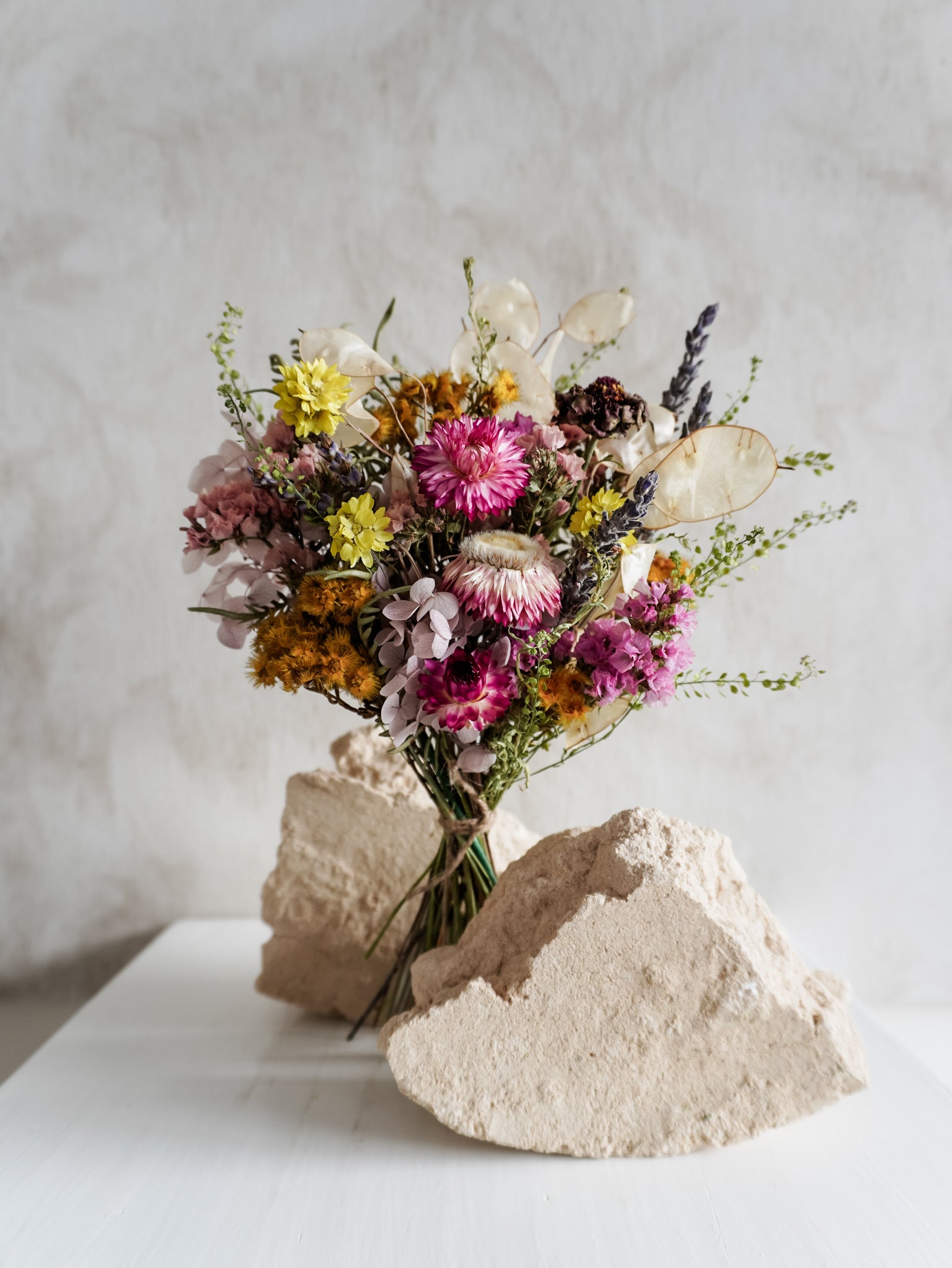 Dried flower meadow bouquet bright and colourful featuring spring flowers – Posy Size Distant View.