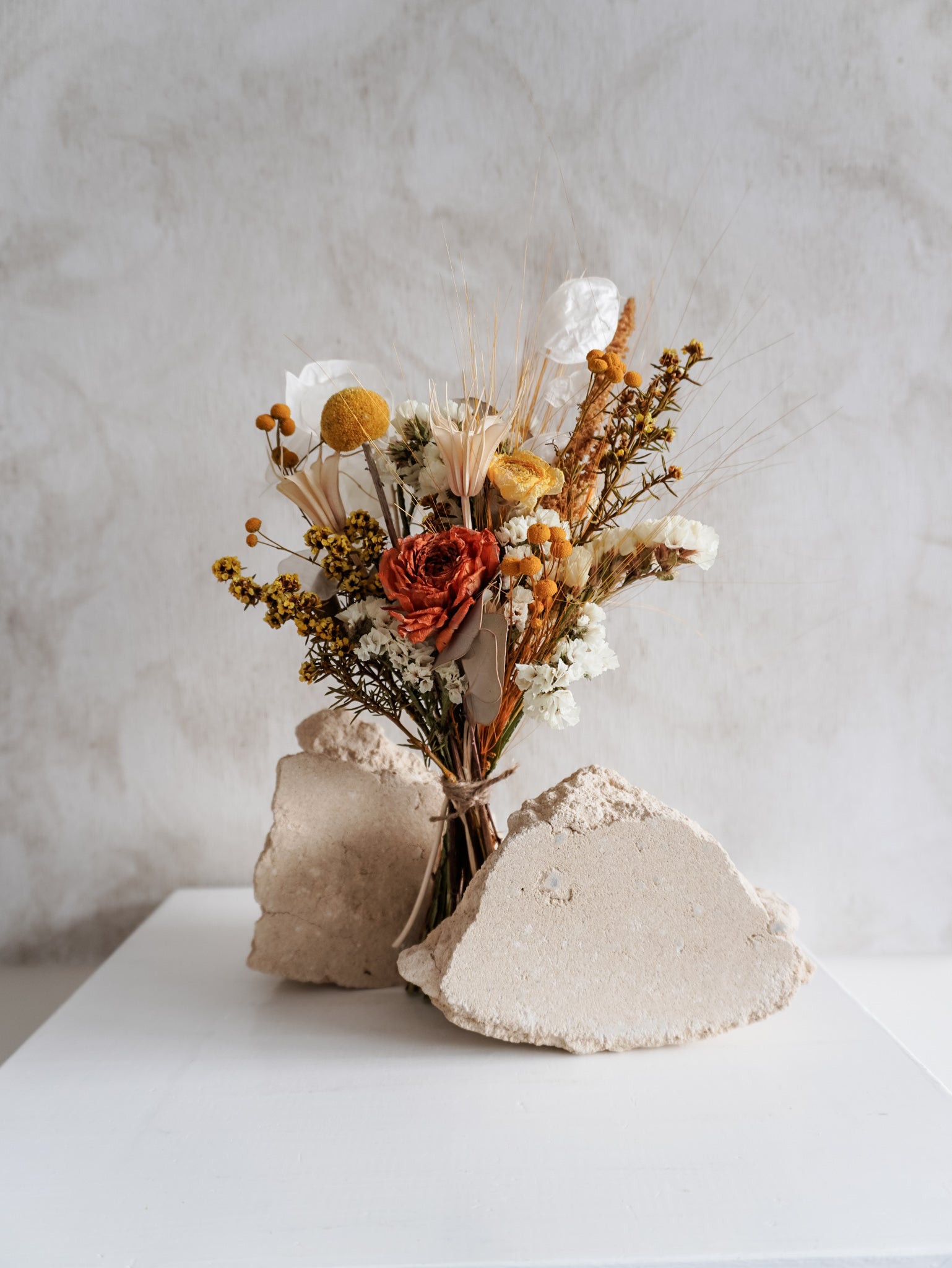 Dried flower bouquet warm sunshine tones in a rustic boho style – Posy Size Distant View.
