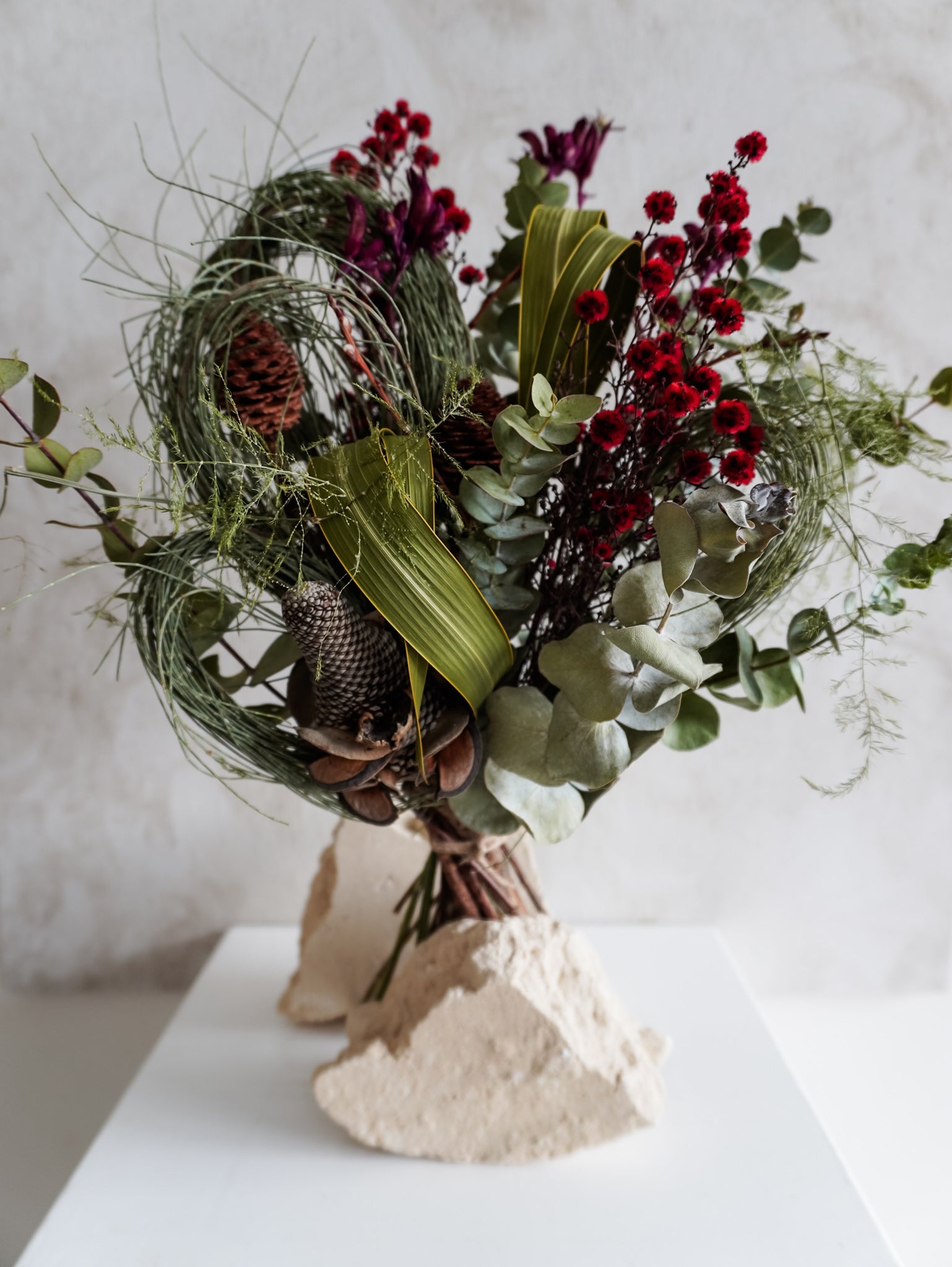 Dried flower bouquet in Christmas red and green featuring Australian native florals – Classic Size Close View.