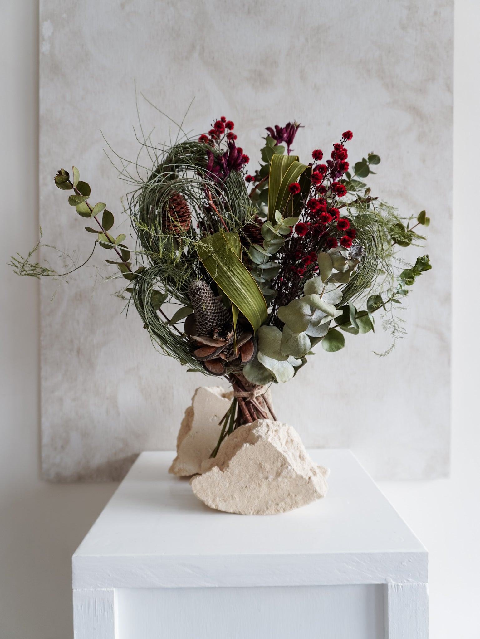 Dried flower bouquet in Christmas red and green featuring Australian native florals – Classic Size Distant View.