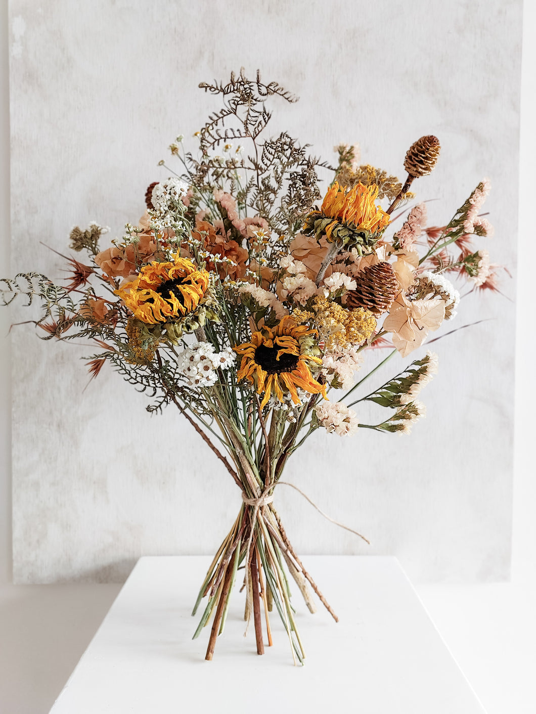 Dried flower bouquet in warm tones featuring seasonal summer flowers – Classic Size Close View.