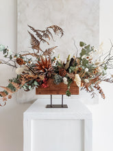 Load image into Gallery viewer, Dried flower centrepiece in rustic vase featuring natural textural florals – front close view 3.
